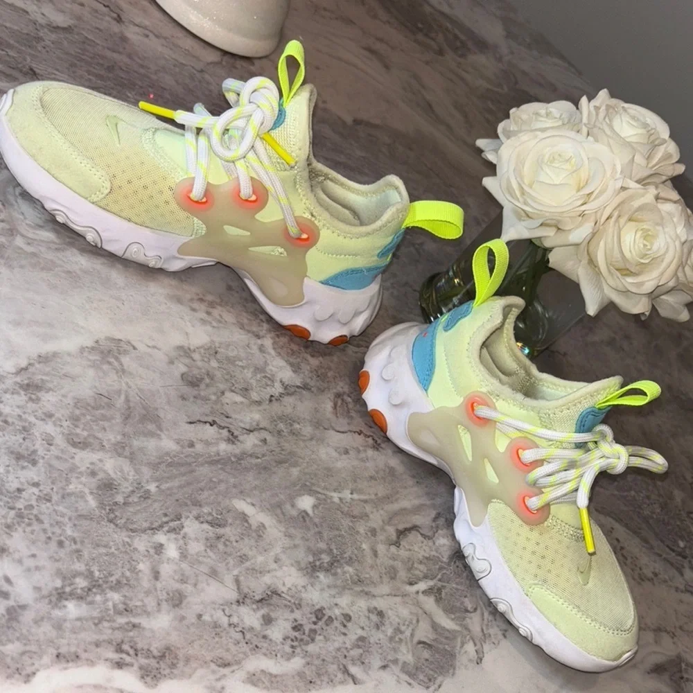 Nike Yellow and Blue React Sneakers Dynamic Design